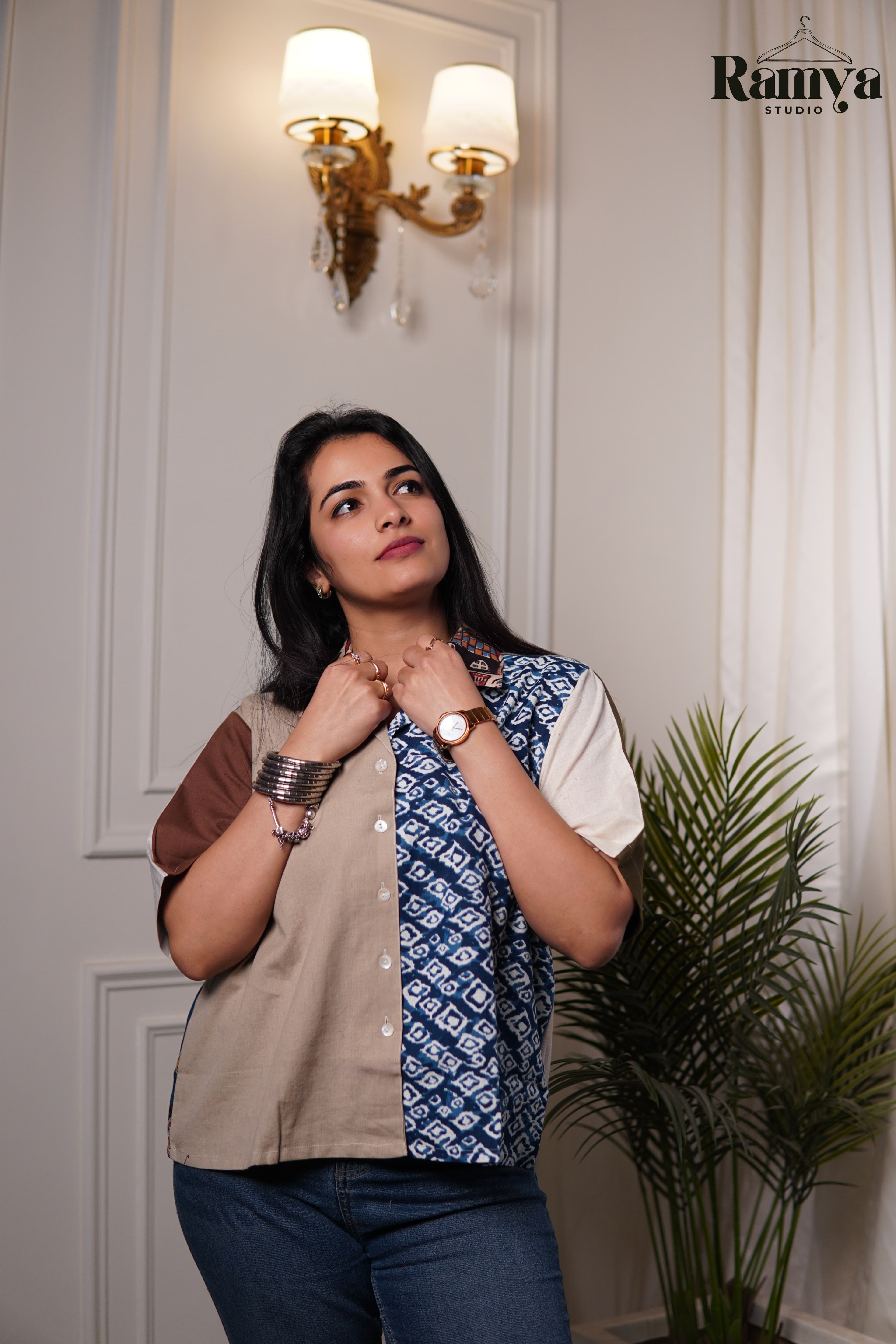Blue Loom Shirt Top featuring a half-and-half patchwork design with beige cotton and indigo diamond block prints, styled with a tan sleeve and structured collar.