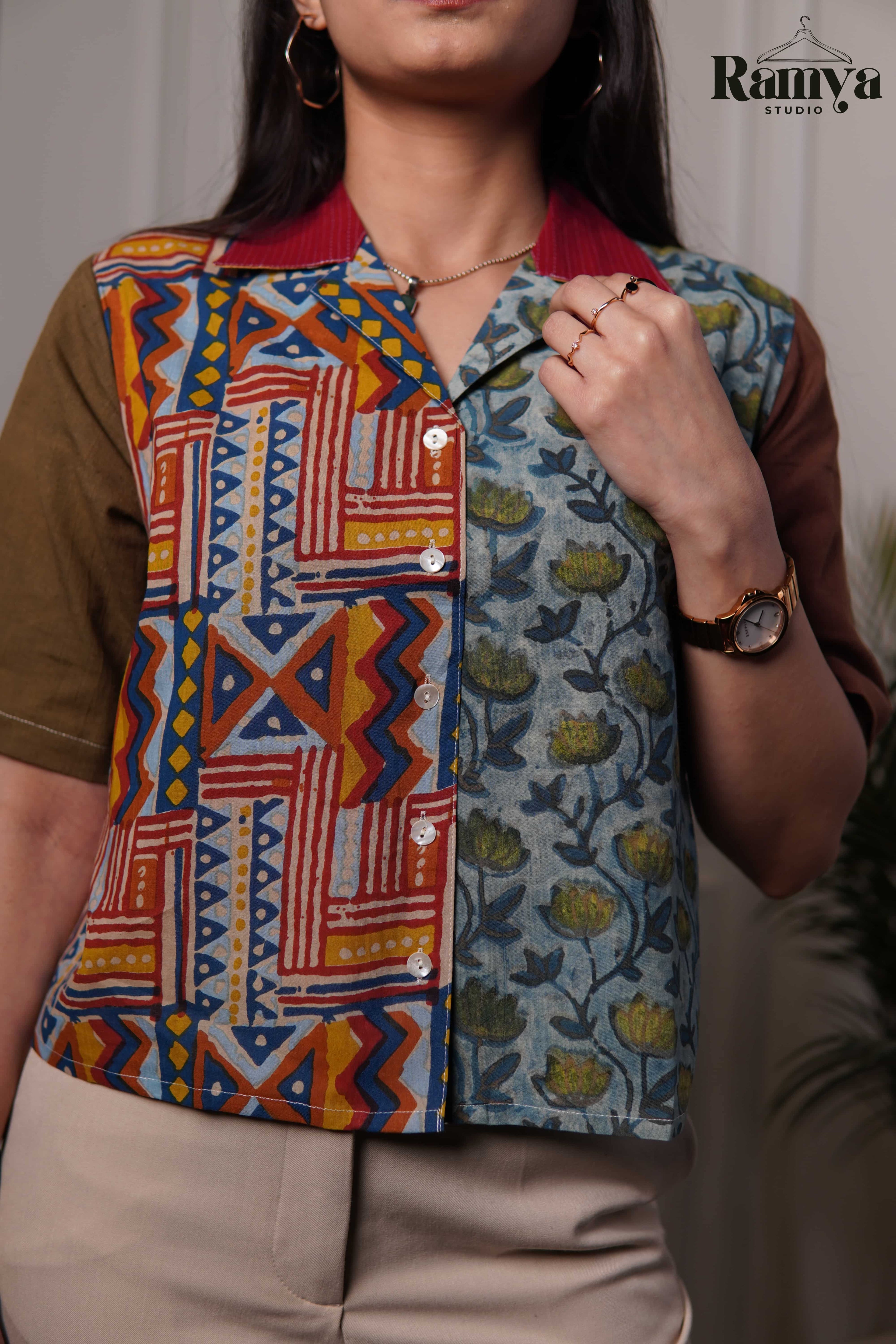 A multi-tonal artisanal shirt top from Ramya Studio, blending earthy olive and rust tones with traditional heritage block prints for a modern bohemian look.